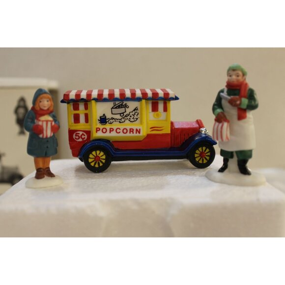 Dept 56 Christmas in the City - Popcorn Vendor - Picture 1 of 6